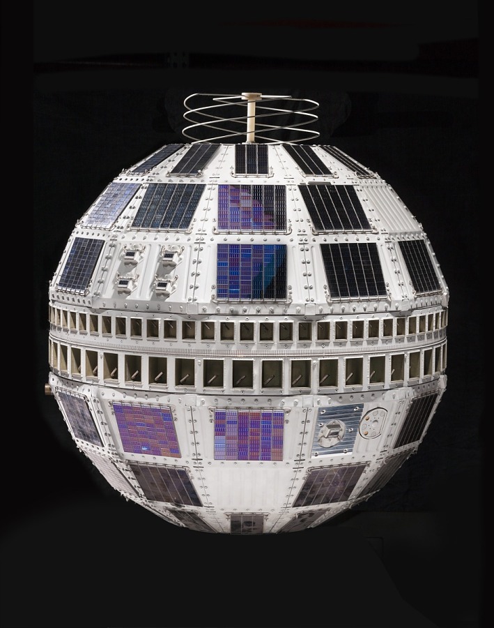 Telstar backup communications satellite. Spherical spacecraft, white exterior covered in solar cells.